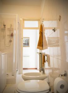 Ванна кімната в Casa Vacanze La Piazzetta - Cascata delle Marmore