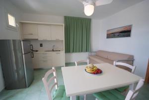Kuchyň nebo kuchyňský kout v ubytování Hotel Dino