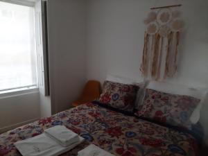 Postel nebo postele na pokoji v ubytování Casa do Xico