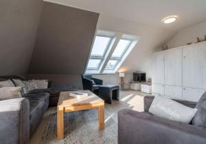 Posezení v ubytování Appartementanlage am Strand Appartementanlage am Strand Meerblick - 9