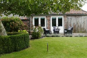 Een tuin van B&B Bed en Omelet