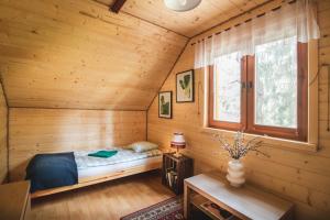 Łóżko lub łóżka w pokoju w obiekcie Jarzębinowa - Dom do wynajęcia na Podlasiu