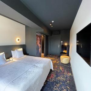 Postel nebo postele na pokoji v ubytování Hotel Montanus