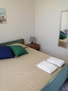 Postel nebo postele na pokoji v ubytování Casa vacanze Le Dune