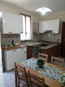 Kuchyň nebo kuchyňský kout v ubytování Casa vacanze Le Dune