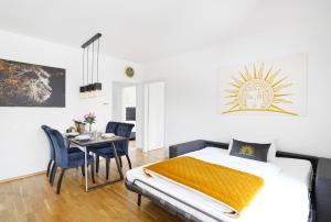 Posteľ alebo postele v izbe v ubytovaní CT-GOLD Apartments - Villach Malina - nahe Atrio und Therme