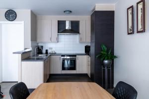 Virtuvė arba virtuvėlė apgyvendinimo įstaigoje Laluna holiday apartment