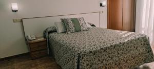 Łóżko lub łóżka w pokoju w obiekcie Hotel Grove