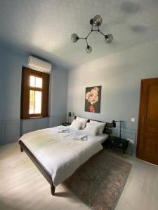 Posteľ alebo postele v izbe v ubytovaní Segesdy Villa