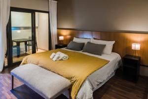 Cama ou camas em um quarto em Plaza Paradiso Petit Hotel