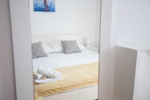 Posteľ alebo postele v izbe v ubytovaní Villa Silvana