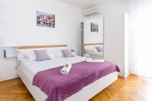 Posteľ alebo postele v izbe v ubytovaní Villa Silvana