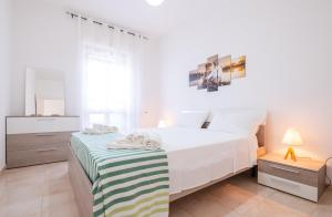 Voodi või voodid majutusasutuse Apartment Mikao - Torre Pali toas