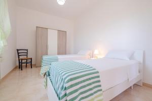 Voodi või voodid majutusasutuse Apartment Mikao - Torre Pali toas