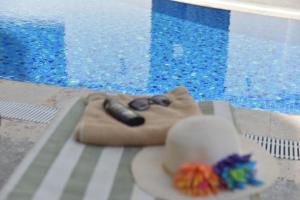 Бассейн в Aurasia Beach Hotel или поблизости
