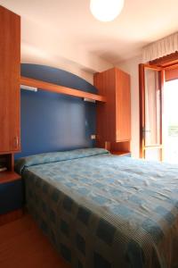 Katil atau katil-katil dalam bilik di Hotel Midi