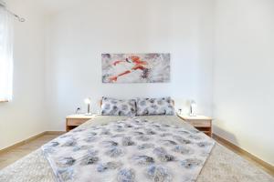 Posteľ alebo postele v izbe v ubytovaní Apartment Jaga