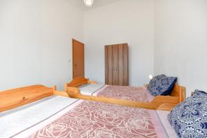 Posteľ alebo postele v izbe v ubytovaní Apartment Jaga