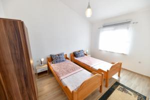 Posteľ alebo postele v izbe v ubytovaní Apartment Jaga