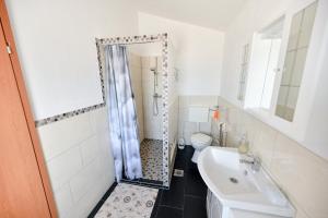 Kúpeľňa v ubytovaní Apartment Jaga