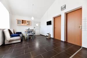 Televízia a/alebo spoločenská miestnosť v ubytovaní Apartment Jaga