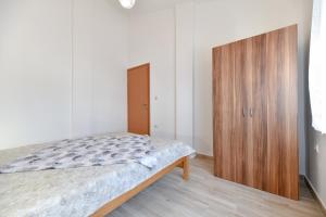 Posteľ alebo postele v izbe v ubytovaní Apartment Jaga