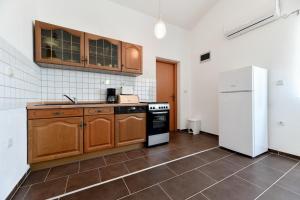 Kuchyňa alebo kuchynka v ubytovaní Apartment Jaga