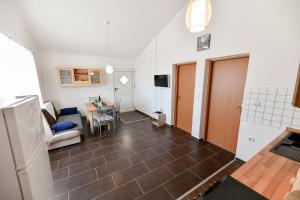 Televízia a/alebo spoločenská miestnosť v ubytovaní Apartment Jaga