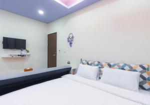 Letto o letti in una camera di Hello Inn