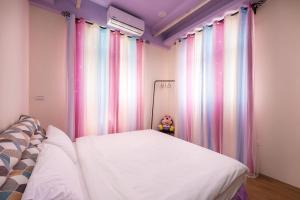 Letto o letti in una camera di Hello Inn