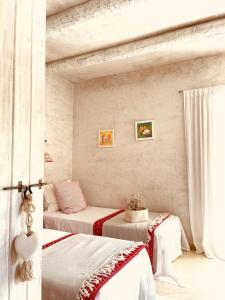 Postel nebo postele na pokoji v ubytování Casa Matelito
