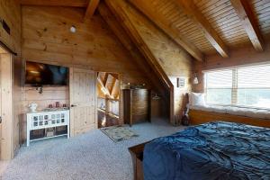 Postel nebo postele na pokoji v ubytování Elk Lodge