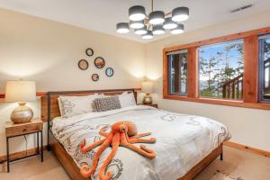 Voodi või voodid majutusasutuse Octopus Den toas