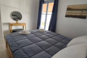 Voodi või voodid majutusasutuse Beachfront 2Br Garden Bbq SeaView QuietRetreat toas