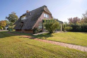 Aed väljaspool majutusasutust Hus Dünenkieker SPO Hus Dünenkieker SPO