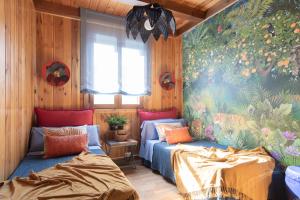 Postel nebo postele na pokoji v ubytování El Jardin de Gala + 37 fotografií
