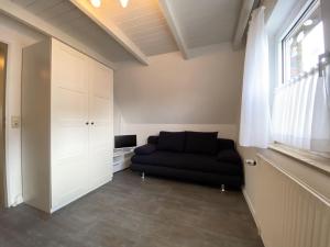 Posezení v ubytování Blaue Oase Ferienhaus