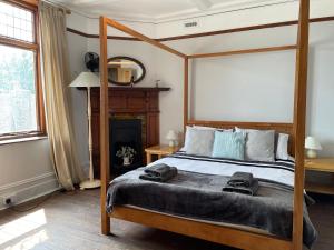 A bed or beds in a room at Castle House