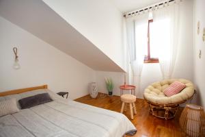 Posteľ alebo postele v izbe v ubytovaní Apartment Kika