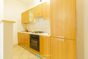 Kuchyň nebo kuchyňský kout v ubytování AFRODITE FLAT - TORRE DELL'ORSO