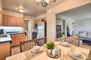 a kitchen and dining room with a table and chairs at Billings Abode with Grill Walk to Park and Shops in Billings