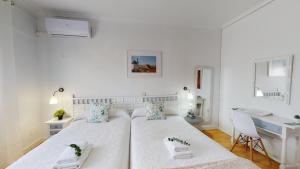 Katil atau katil-katil dalam bilik di Hotel Consuegra