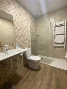 Ванная комната в HOSTAL RESTAURANTE SAN ISIDRO