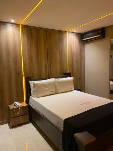 Katil atau katil-katil dalam bilik di Motel Exótico Prime - Próximo GRU Aeroporto