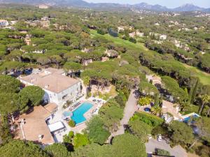 an aerial view of a mansion with a swimming pool at Le Confidentiel Hôtel & SPA in Saint-Raphaël +71 photos