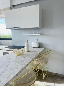 Kuchyňa alebo kuchynka v ubytovaní Vixen Apartment