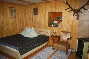 Llit o llits en una habitació de Sadyba Lukacha