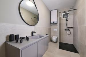 Et badeværelse på Apartments Dolcea