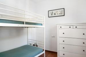 Postel nebo postele na pokoji v ubytování Poniente