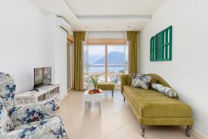 Гостиная зона в M&M&M Apartments